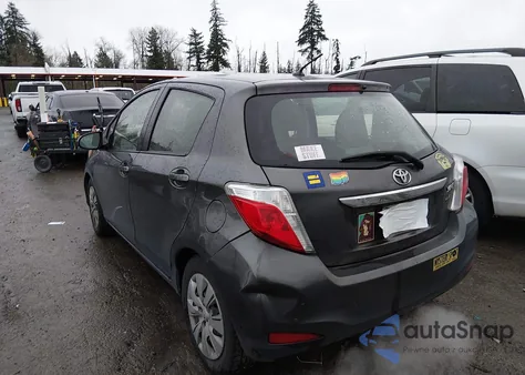 2012 Toyota Yaris Le z USA, uszkodzony, nr VIN JTDKTUD38CD527163